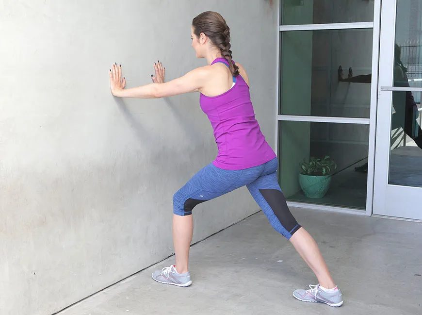 Calf muscle stretch with wall