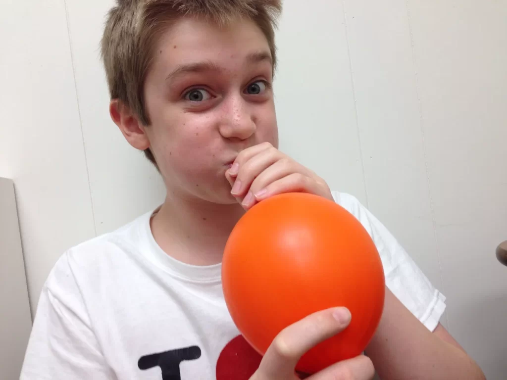 Balloon Blowing Using Only Nose