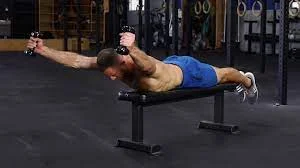 prone y extension with dumbbells